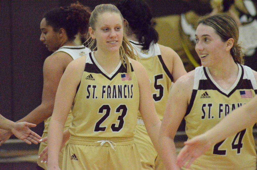 Former Mother McAuley star Hannah Swiatek (right) smiles and walks off the court with Justene Charlesworth after a recent University of St. Francis victory over Cardinal Stritch. Photo by Jeff Vorva Former  Mother McAuley star Hannah Swiatek (right) smiles and walks off the court with Justene Charlesworth after a recent University of St. Francis victory over Cardinal Stritch. Photo by Jeff Vorva