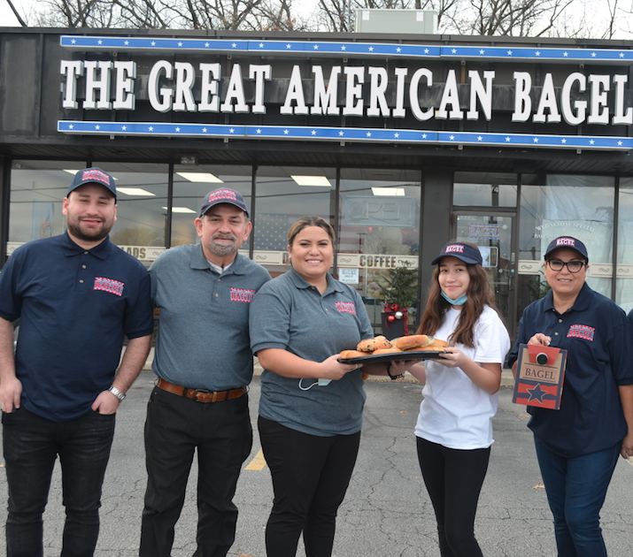 The Rios family plans to make The Great American Bagel shop at 12774 S. Harlem Ave. a go-to breakfast and lunch choice in Palos Heights and beyond. Pictured (from left) are Manny Jr. Manny Sr., daughter Silvia, Mia and mother Silvia Rios. (Photo by Cosmo Hadac)