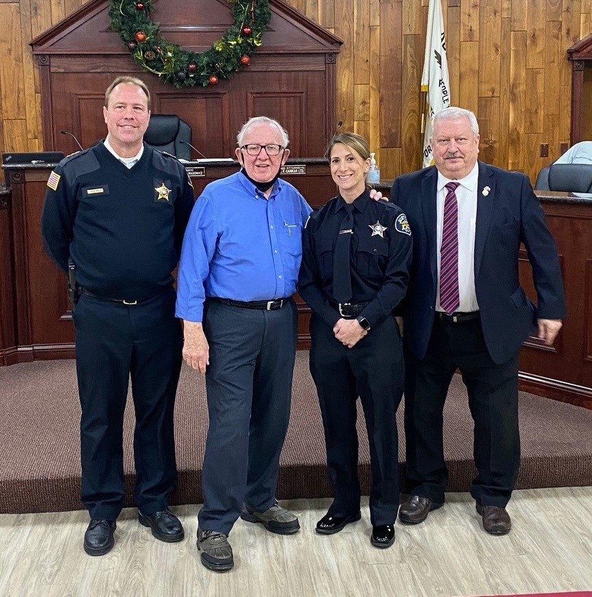 Justice Police Chief Kraig McDermott (from left), Justice Police and Fire Commissioner Don McGuire, Justice Police Officer Kady Sassenger, and Justice Mayor Kris Wasowicz. (Photo by Carol McGowan) 