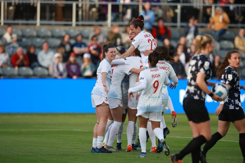 Orland Park’s Tatumn Milazzo is high on the top of the pile for the celebration of the Red Star goal by Amanda Kowalski Saturday against Racing Louisville. Photo courtesy of the Chicago Red Stars