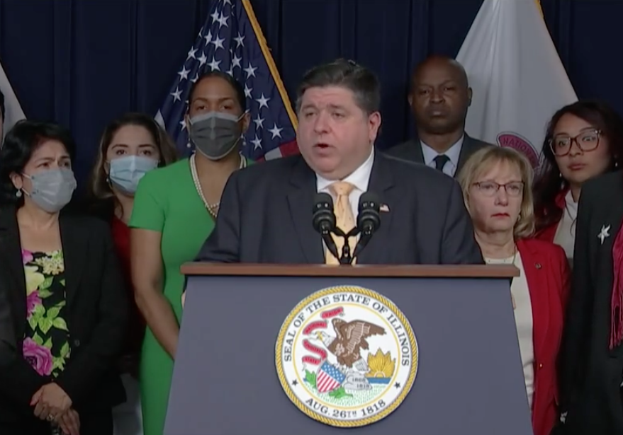 Governor JB Pritzker stands with other pro-choice Democrats at a press conference to denounce the possibility of the U.S. Supreme Court overturning its 1973 Roe v. Wade decision and turning the issue of abortion access back to the states. --Screenshot of a live-streamed event