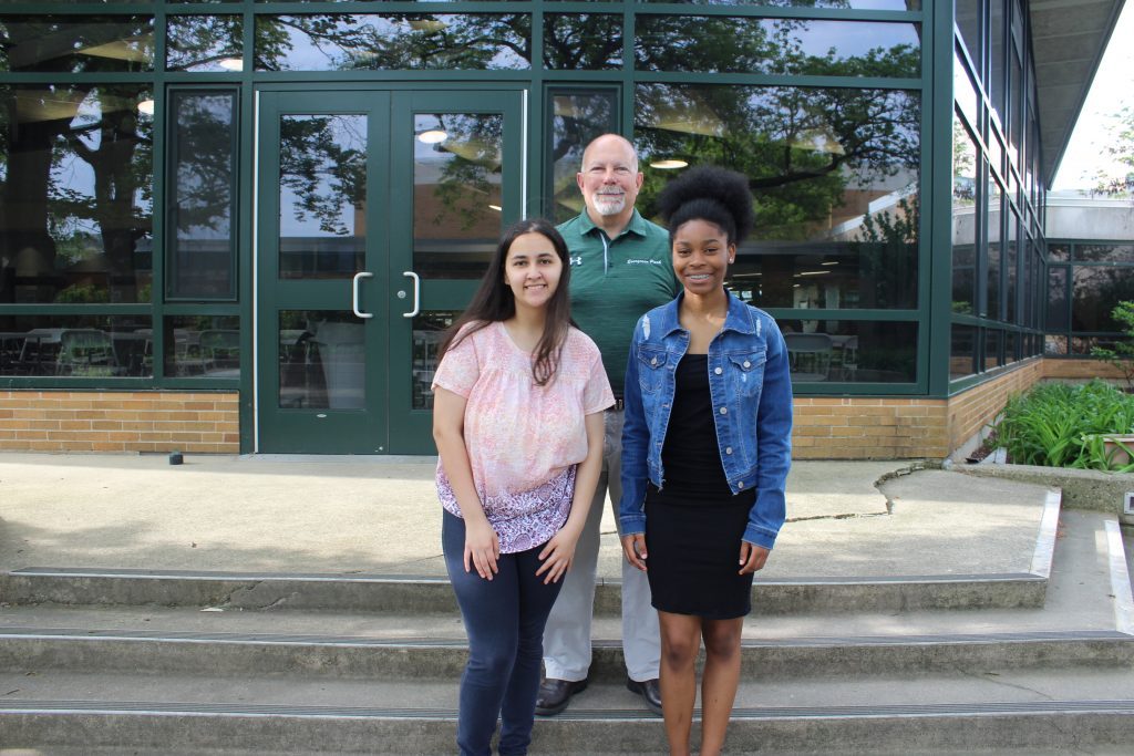 EPCHS Principal Bill Sanderson stands with seniors Marissa Burke and Diana Tracey who had perfect attendance throughout their four years of high school. (Supplied photos)