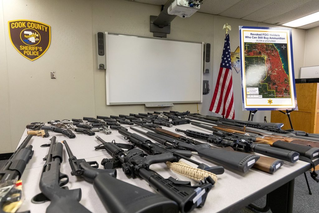 At his recent press conference, Dart displayed a number of firearms confiscated by Sheriff’s Police. --Supplied photo