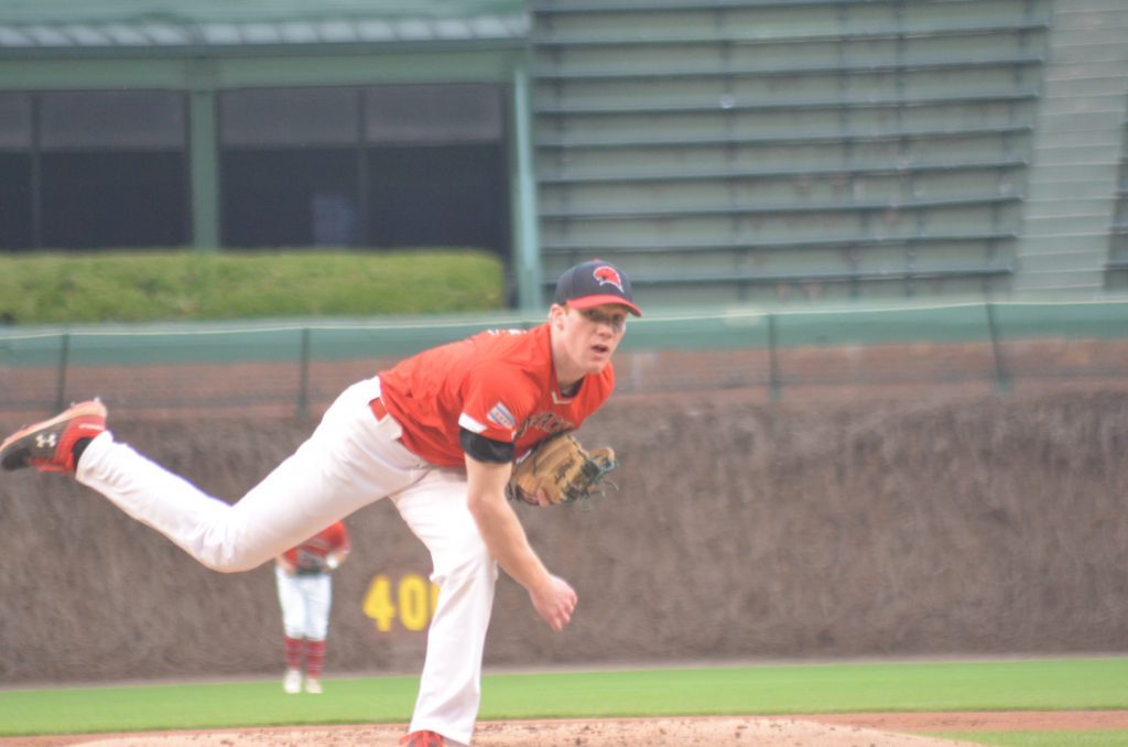 Orland Park's Jack Brannigan, shown pitching for Marist in a rare high school game at Wrigley Field in 2019, hopes to play in a major league park soon as he was drafted in the third round by Pittsburgh. Photo by Jeff Vorva
