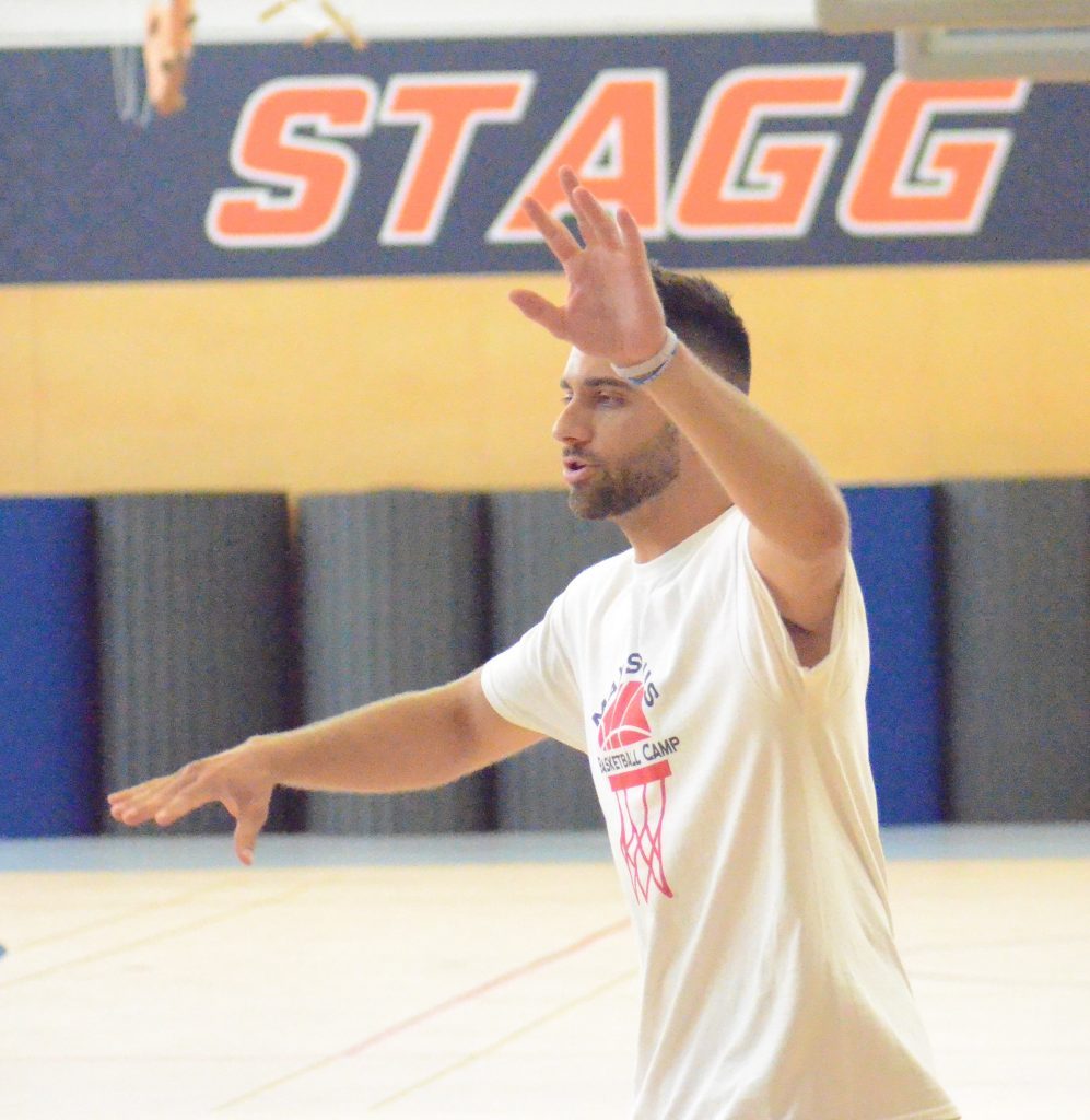 Former Stagg basketball star Max Strus, now a starter with the Miami Heat, gives a talk to players at his camp on Monday. Photo by Jeff Vorva