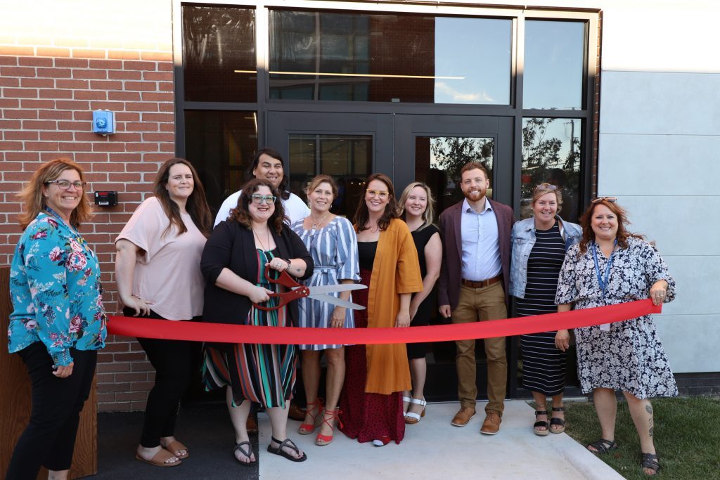 District administrators and staffers were on hand last Thursday when Ridgeland School District 122 cut the ribbon to open its new Fine Arts Center. (Photo supplied by Ridgeland School District 122)