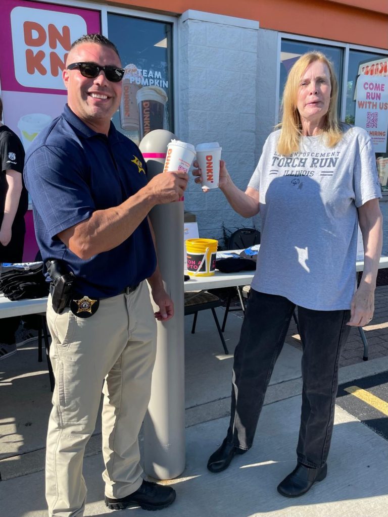 Worth Police Chief, Tim Denton, and Worth Mayor, Mary Werner, enjoyed coffee together during last year's Cop on a Rooftop in Worth. (File photo)