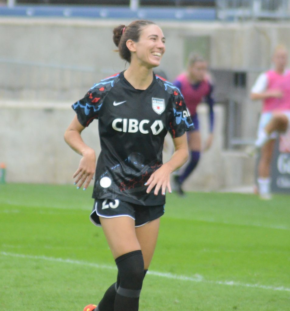 Orland Park native Tatumn Milazzo is all smiles during the Red Stars' 2-0 victory over Gotham. She scored a goal and anchored the defense in a shutout.  Photo by Jeff Vorva