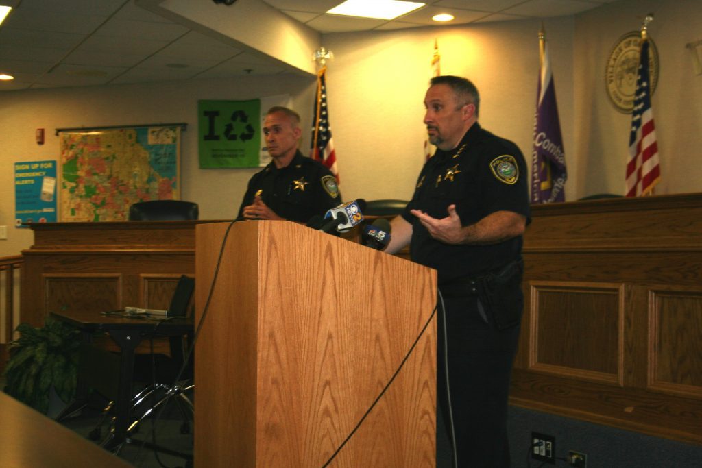 Oak Lawn Police Chief Dan Vittorio, accompanied by Division Chief Gerald Vetter on his right, speaks to the media last summer to defend the actions of Oak Lawn police officers filmed beating Hadi Abuatelah during an arrest. (Photo by Joe Boyle)