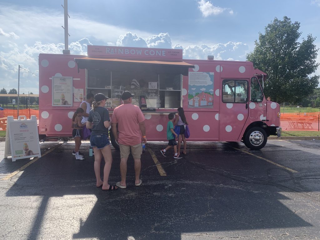 Rainbow Cone brought its pink food truck to the Taste grounds last year, selling its classic cones to help people beat the heat. (File photo)