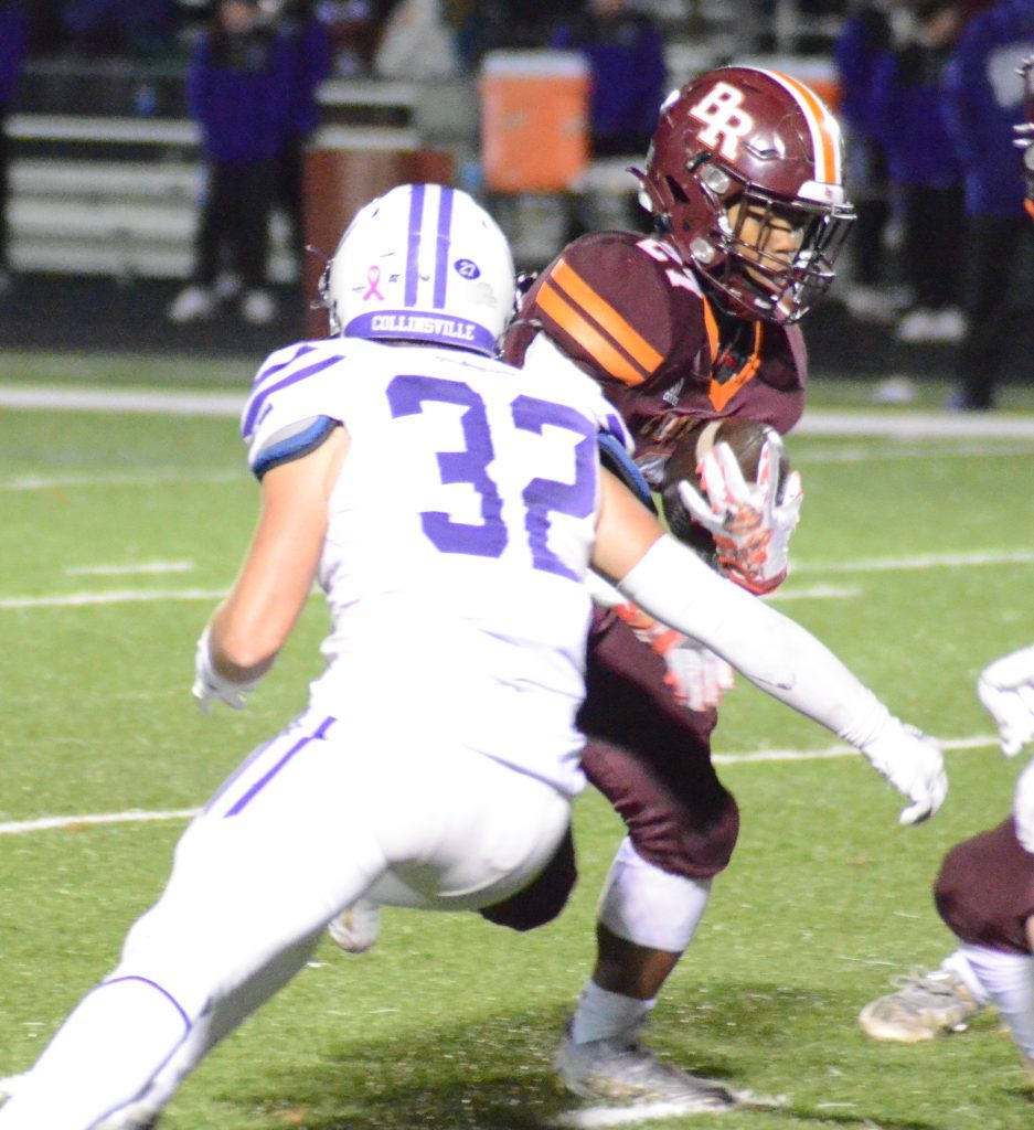 Brother Rice running back Te'Shon McGee picks up yards against Collinsville during the Crusaders’ win in the Class 7A playoffs on Nov. 5. Photo by Jeff Vorva