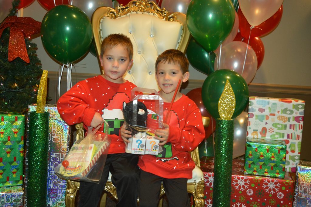 Twins Aiden and Ethan Schilling at last year’s Bingo with Santa. (Photo by Alexandria Shipyor)