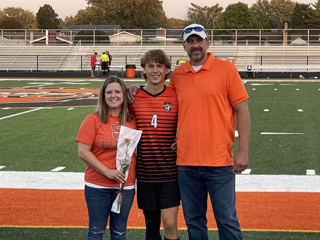 Ryan Plowman and his parents at Shepard Senior Night. (Supplied photo)