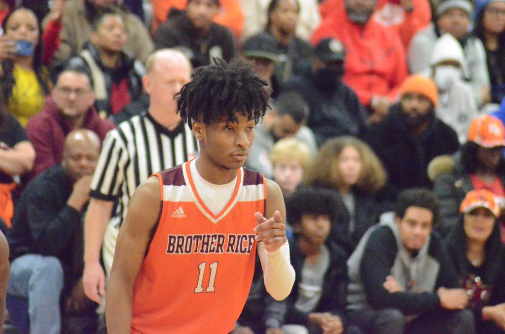 Brother Rice senior Ahmad Henderson scored 34 points, 29 of them in the second half, to help the Crusaders defeat St. Rita in a Class 4A sectional semifinal on March 1. He sustained an injury that kept him largely off the court in the sectional final against Kenwood. Photo by Jeff Vorva