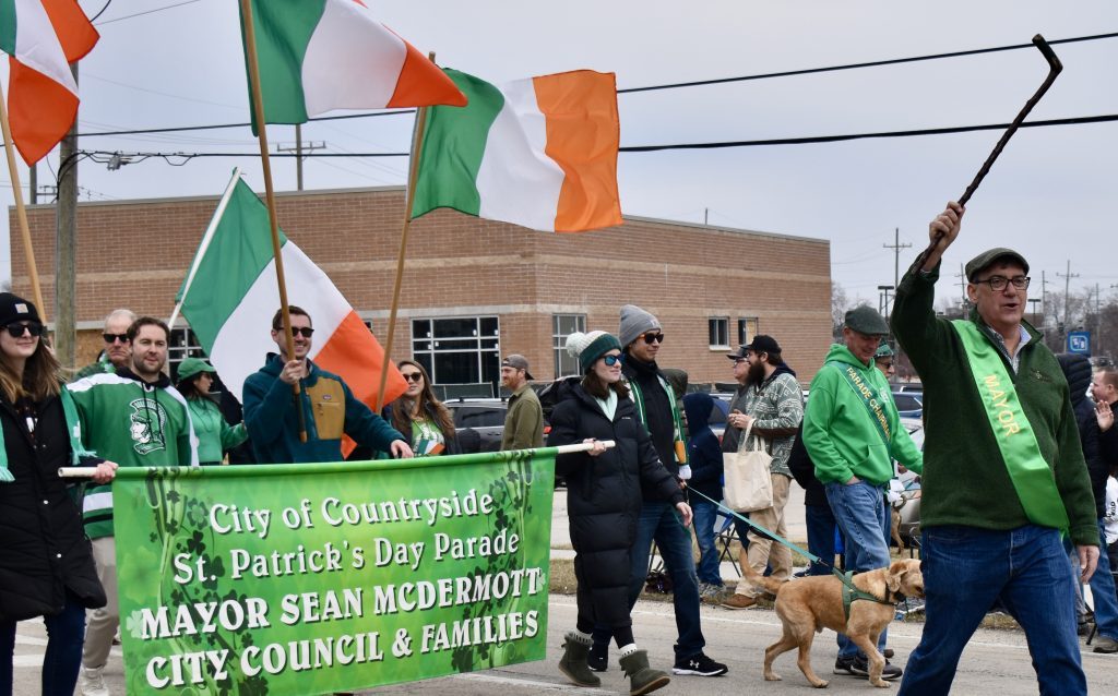 It’s not a parade without politics. Mayor Sean McDermott and elected officials marched in the parade. So did their challengers. (Photos by Steve Metsch)
