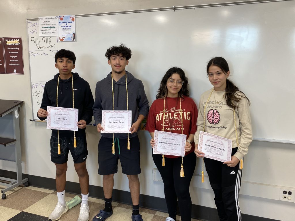Argo bilingual students display their chords and Seal of Biliteracy certificates. (supplied photo)