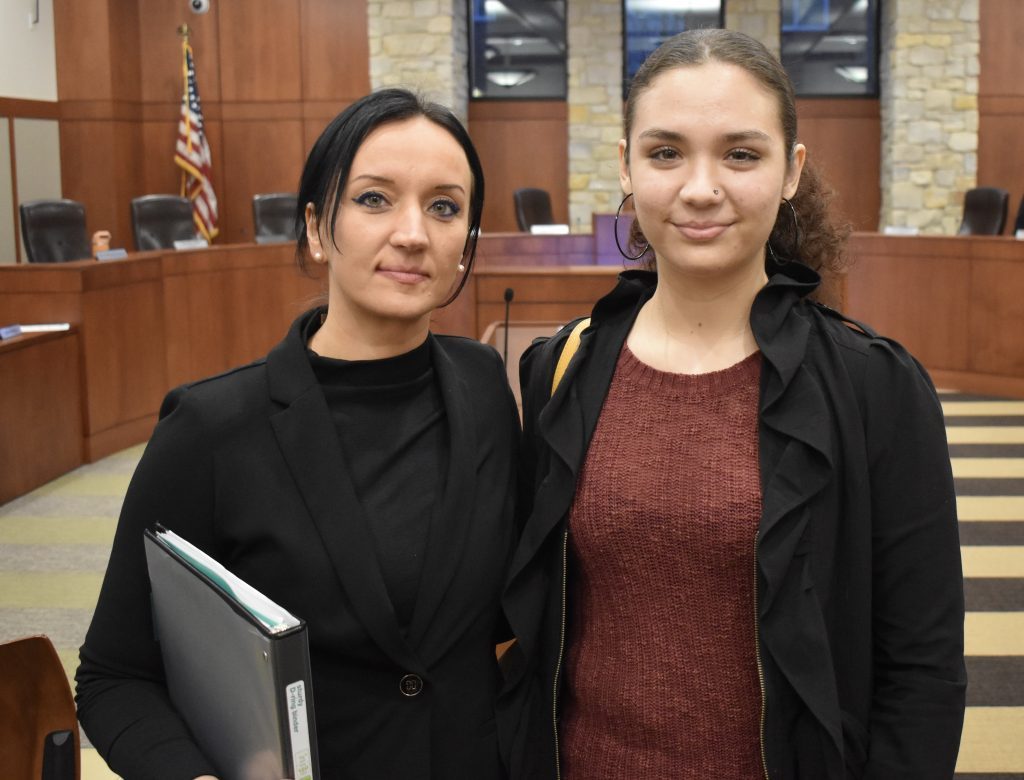 Maria Nedelcu and daughter Julia Torres (right) say Torres should get her job back with the Countryside Police Department. Torres had refused to get the COVID-19 vaccine. (Photo by Steve Metsch) 