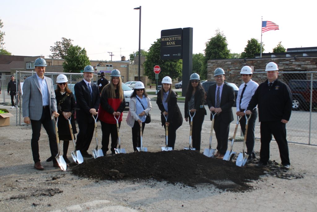 Elected officials, school board members and staff from Summit School District 104 break ground Saturday on the district’s new administrative center. (Supplied photo) 