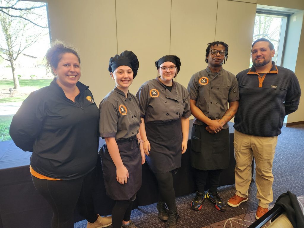 Teachers Erin Quinlan and Dan Solski with Shepard High School students Emily Sheppard, Isabelle Gilbert, and Jabari Harvey. They won first place at the Moraine Valley Community College Culinary Contest. (Supplied photos)