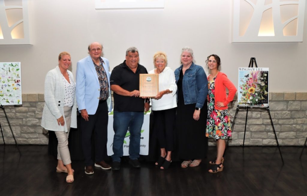 Bedford Park Park District Executive Director Kathy McMullin (from left), Mayor Dave Brady,  Public Works Superintendent Kevin Ormins, Trustee Nancy Wesolowski. Library Program Coordinator/Historian Bridget Ormins, and Nikki Mrkacek of the Park District proudly hold their award.