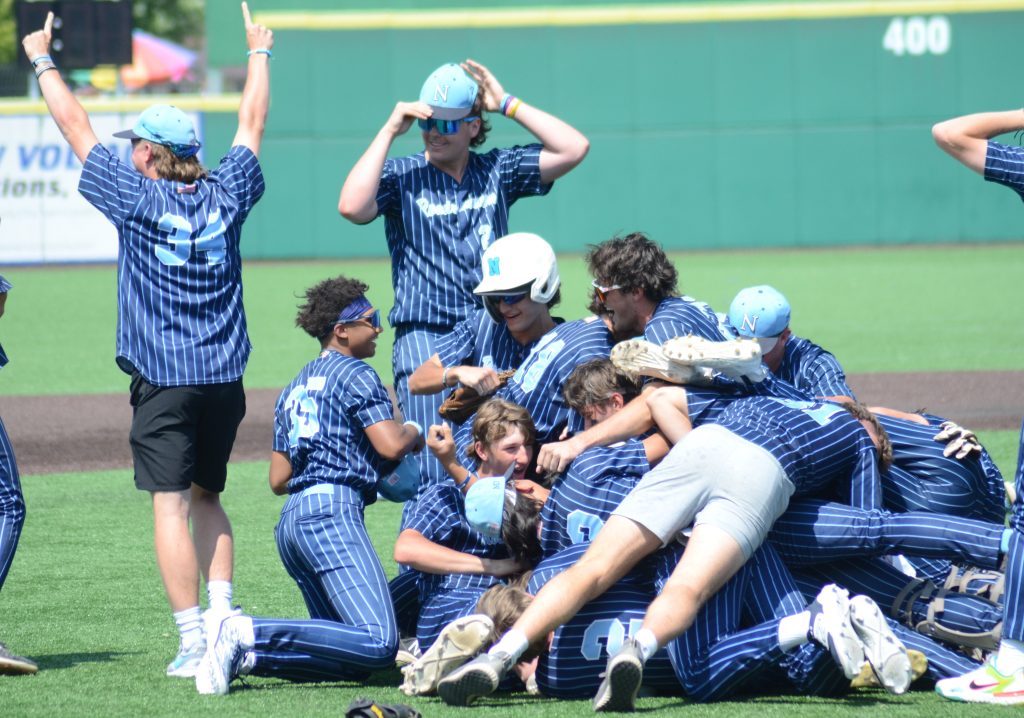 Nazareth players celebrate their Class 3A state title on June 10 at Duly Health and Care field in Joliet. (Photos by Jeff Vorva)