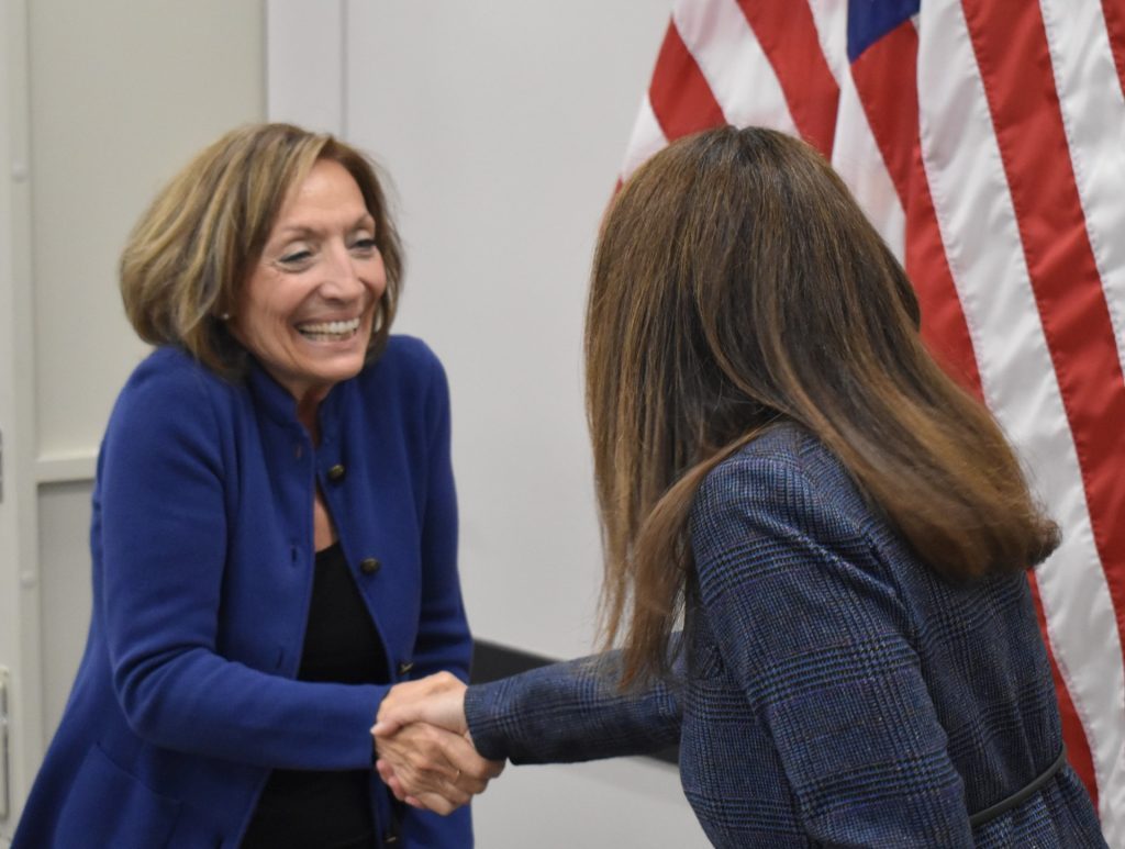 Barbara Minneci is sworn in as a commissioner on the township mental health commission by Lyons Township Clerk Elyse Hoffenberg. (Photo by Steve Metsch) 