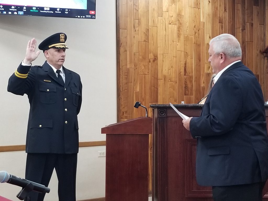 Officer Frederick S. Schuerg is sworn in as new deputy chief by Justice Mayor Kris Wasowisz. (Photos by Carol McGowan)