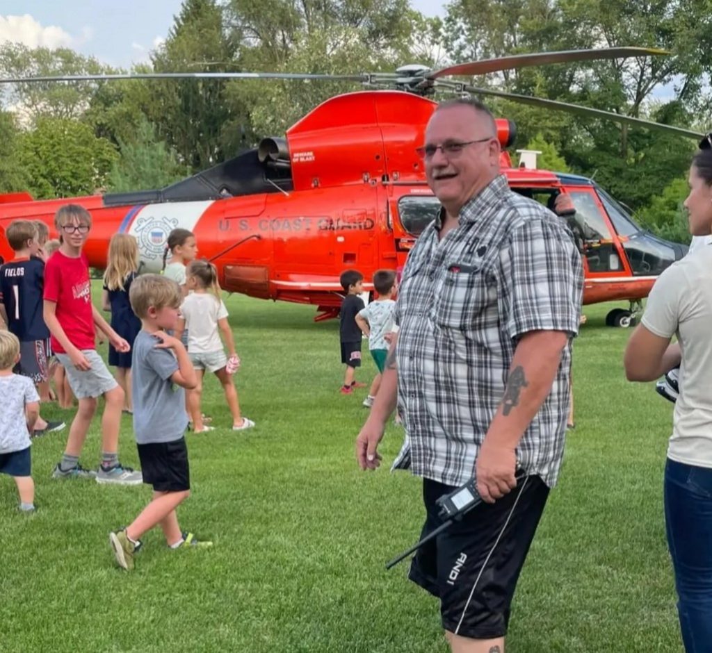 Children flock to see the the Coast Guard helicopter at Indian Head Park's National Night Out. (Photos by Carol McGowan)