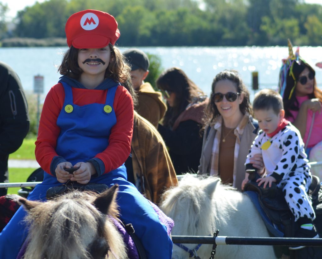Quinn Carpenter, of Naperville and formerly of Palos Hills, dressed up as Mario and rode a pony at the Great Pumpkin Party on Oct. 7 at Centennial Park in Orland Park. (Photos by Jeff Vorva)