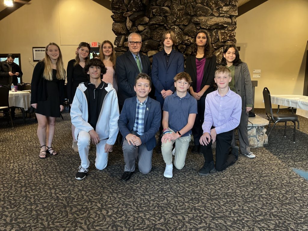 Palos Heights eighth-graders join Mayor Bob Straz before conducting a “mock” city council meeting as part of Mayor for a Day activities. (Photo by Nuha Abdessalam)