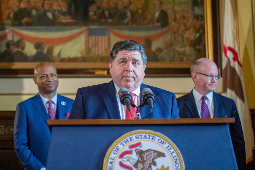 ANALYSIS: Pritzker urges ‘careful’ approach as current-year surplus could be followed by deficit