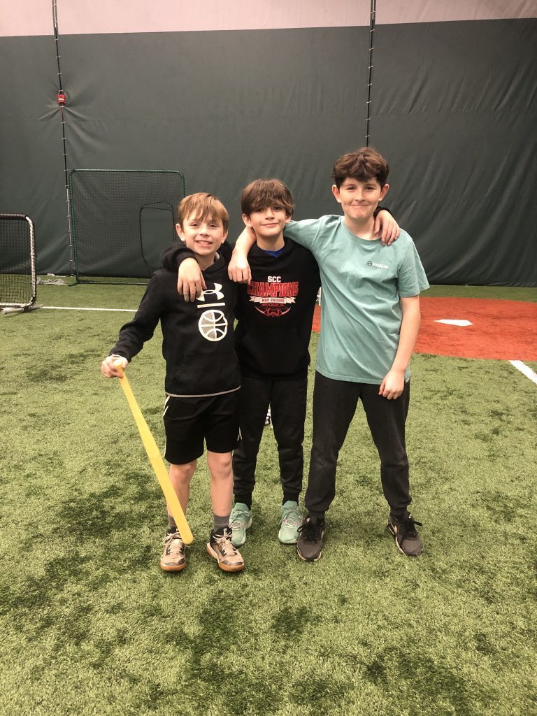 Mustang Baseball Academy players Jimmy Duggan, Patrick Juarez and Gideon Earley were Wiffle ball champs in the tournament, which benefited Toys for Tots. Photo courtesy of Evergreen Park High School