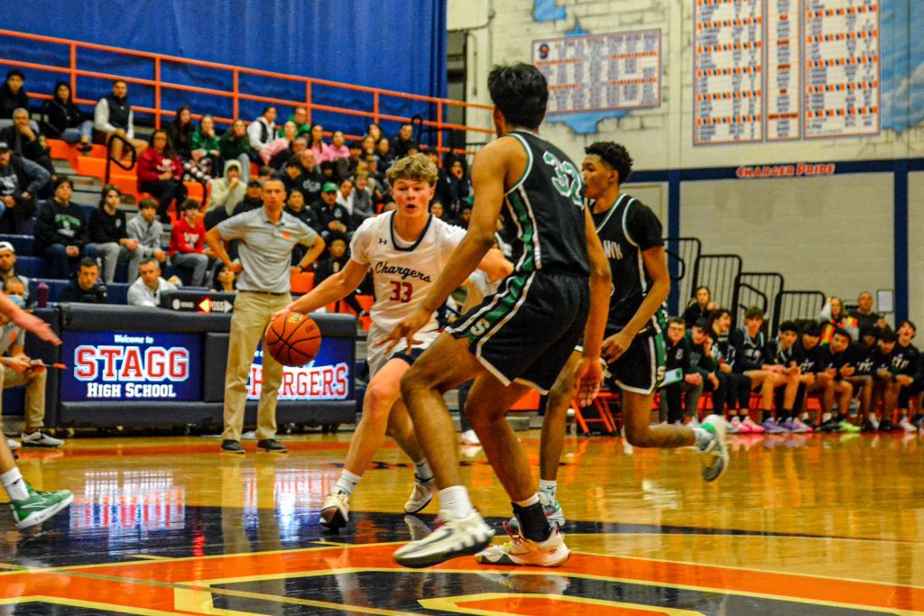 Stagg's Connor Williams scored 16 points in the Chargers' 92-82 win over previously unbeaten Oak Lawn. Photo by Xavier Sanchez