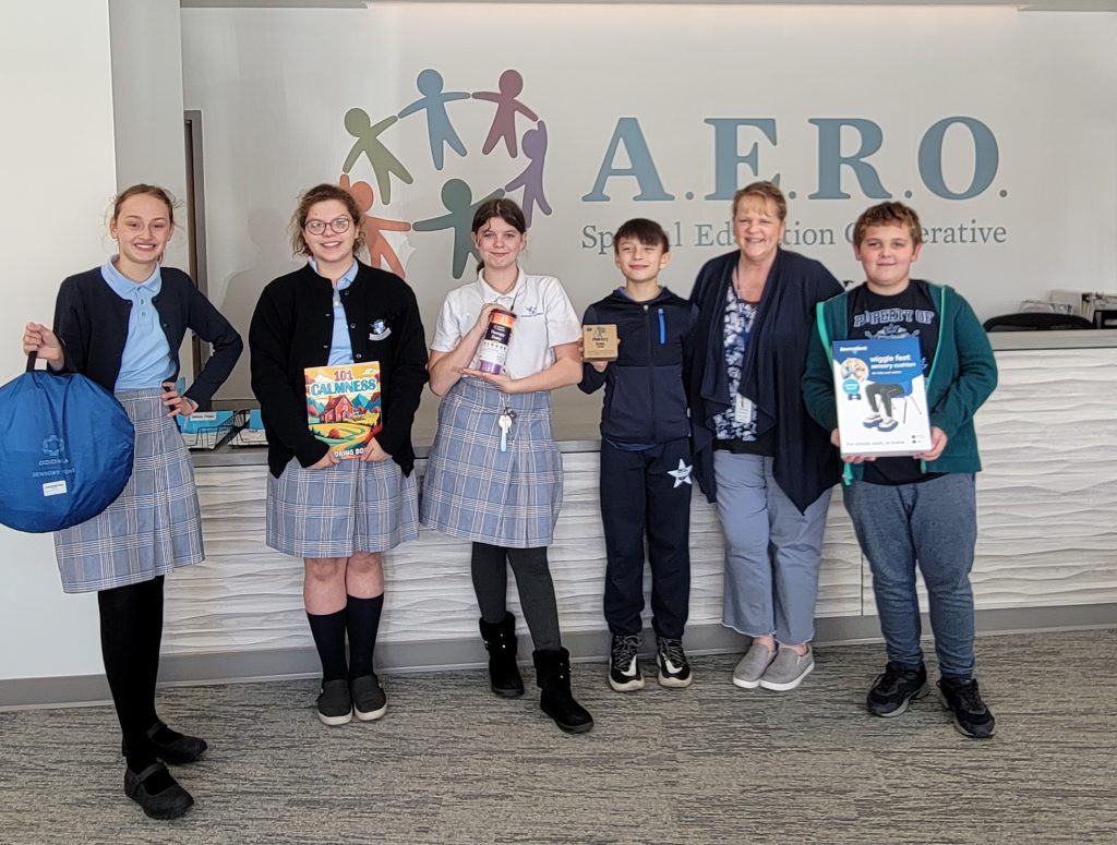 St. Albert the Great students make a donation to the AERO special education co-op. (Supplied photo)