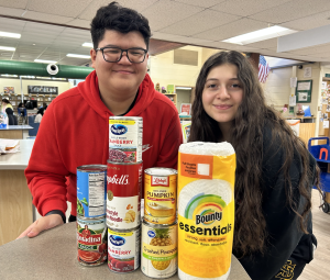 reporter 11 28 olchs food drive 2023