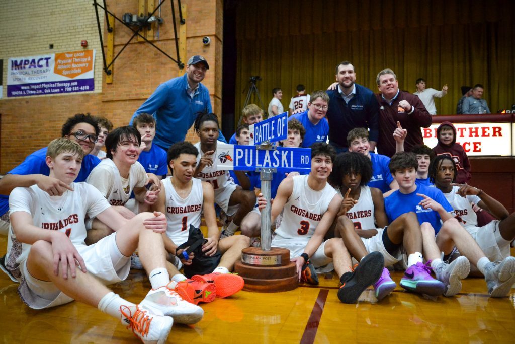 Brother Rice earned the Pulaski Post after defeating Marist, 65-47, on Jan. 16. The trophy will be awarded annually to the winner of the annual rivalry game between the two Mount Greenwood schools. Photo by Xavier Sanchez
