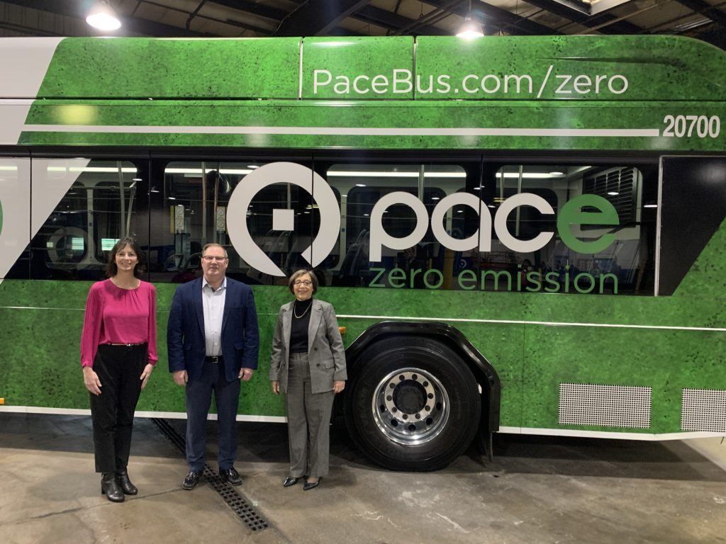 Evergreen Park Mayor Kelly Burke (from left), Pace Chairman Rick Kwasneski, and Pace Executive Director Melinda Metzger stand next to the agency’s first electric bus. (Photo courtesy of Pace Suburban Bus)