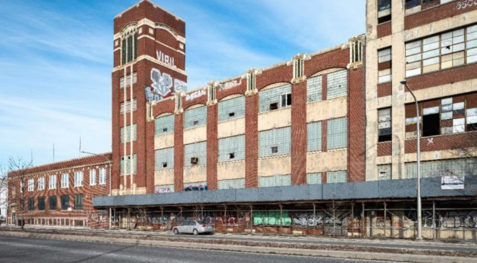 The façade of the Continental Can. Co plant has been a McKinley Park eyesore for years. Developers envision a new building with a utilitarian yet attractive exterior. --Supplied photos