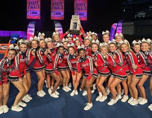 The Marist competitive cheerleading team won the IHSA state title in the large-team division. Photo courtesy of Marist High School