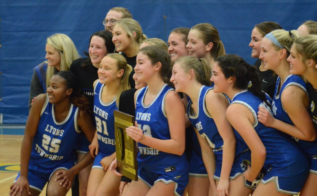 Lyons won its third straight regional title on Feb. 15 with a 57-55 victory over Mother McAuley. Photo by Jeff Vorva