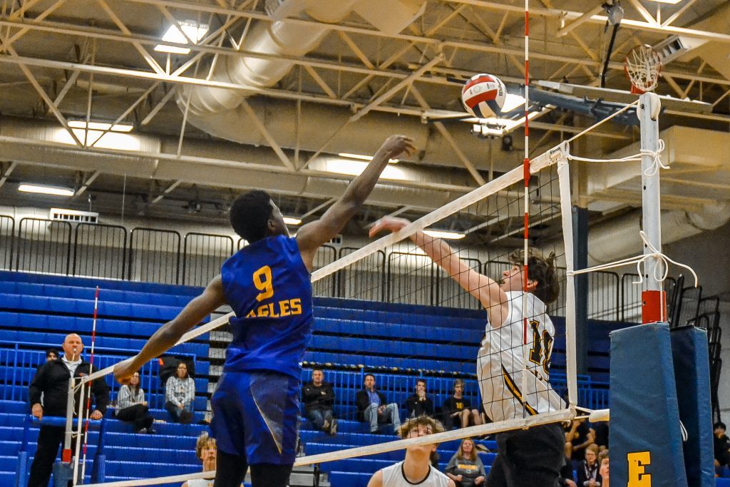 Sandburg junior Jeremiah Aro sends a ball over the net during a match again Hinsdale South on April 3. Photo by Xavier Sanchez