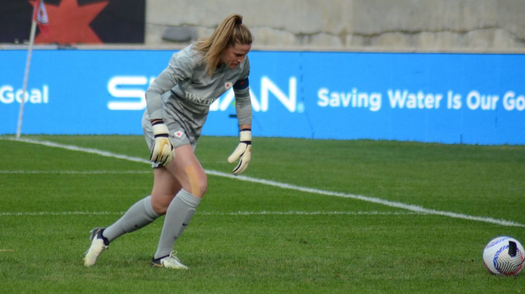 Red Stars goalie Alyssa Naeher, shown retrieving a ball against Washington on May 1, left a May 12 game against Utah with an injury. Photo by Jeff Vorva