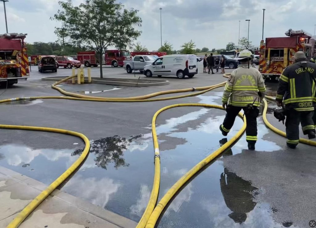 Fire hoses line the parking lot outside of the UFC Gym last Thursday. (Supplied photos)