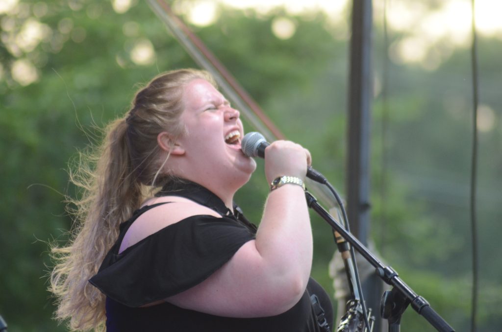 Alyssa Blomberg of the group Ramzi and the Loafers, sings during a performance last year at Orland Park’s inaugural SummerFest. (Photo by Jeff Vorva)