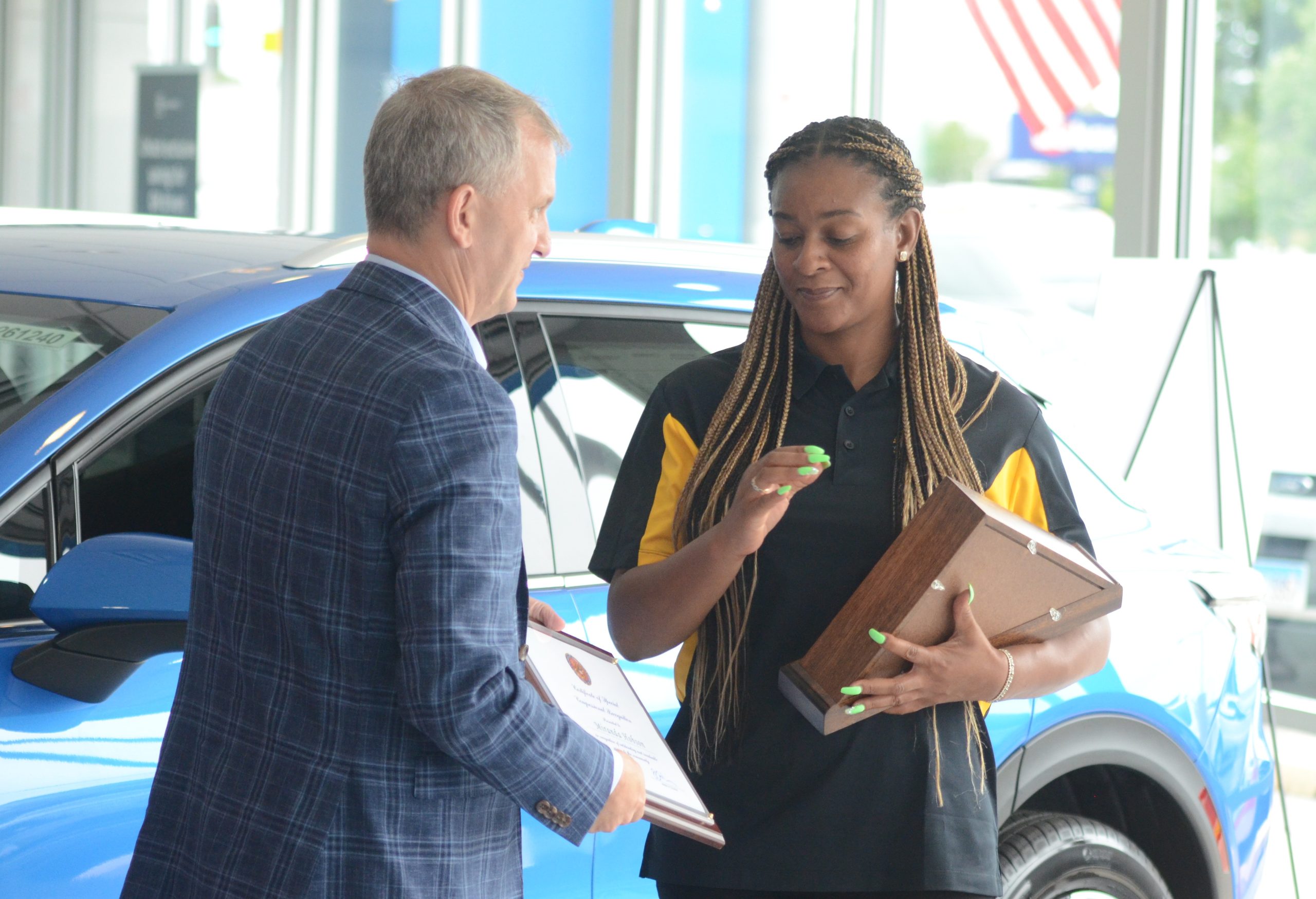 Hickory Hills veteran presented car for her military service