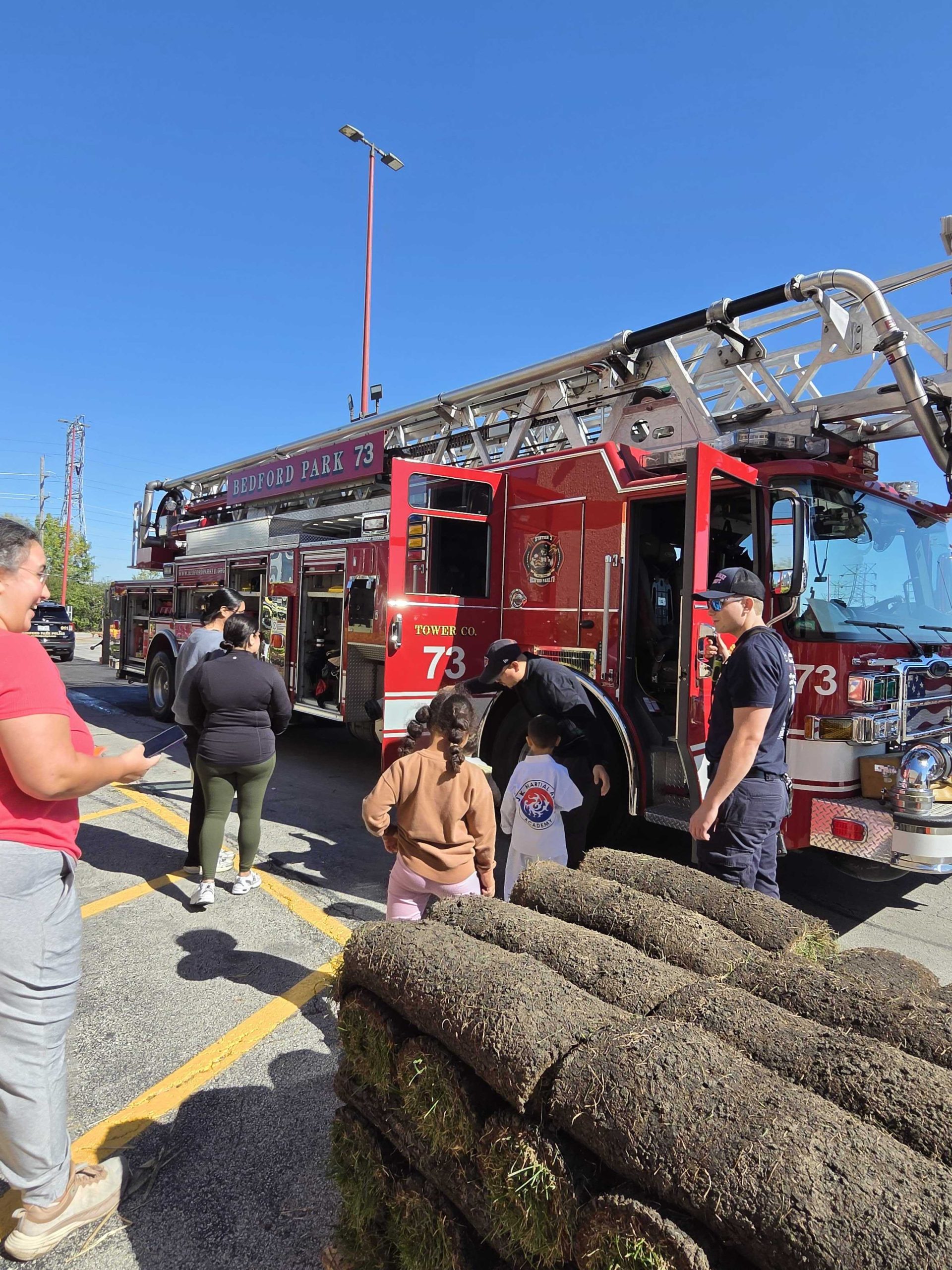 Bedford Park Home Depot honors first responders as 10-year-old marks 100th works...